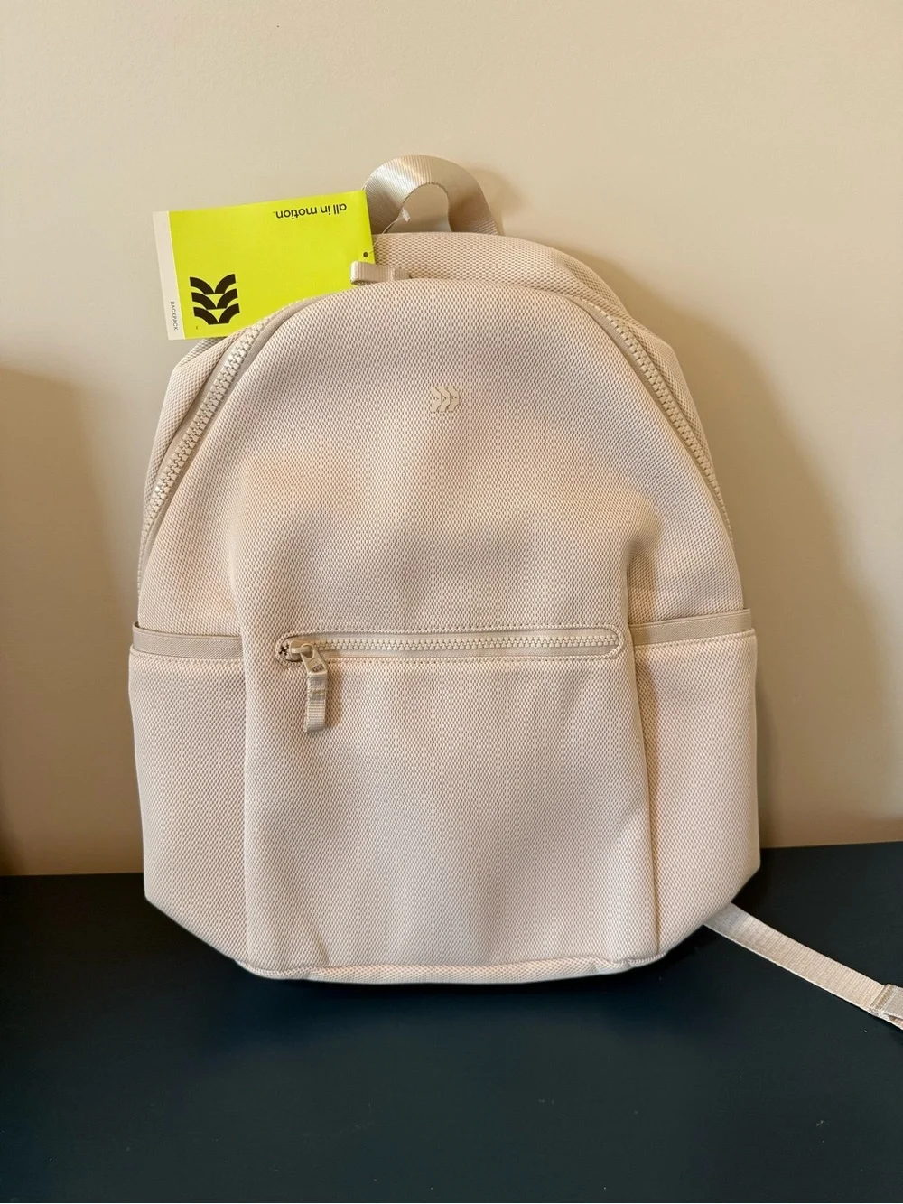 Minimalist Cream Backpack with Front Zip Pocket